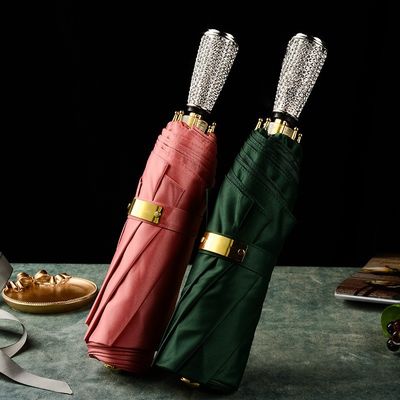 Handmatige besturing Diamant invoeghoes 3 vouw paraplu Unieke regenparaplu's voor vrouwen