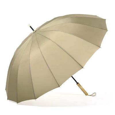 Glasvezelschacht 16K Grote winddichte gele golfparaplu met rechte houten handgreep